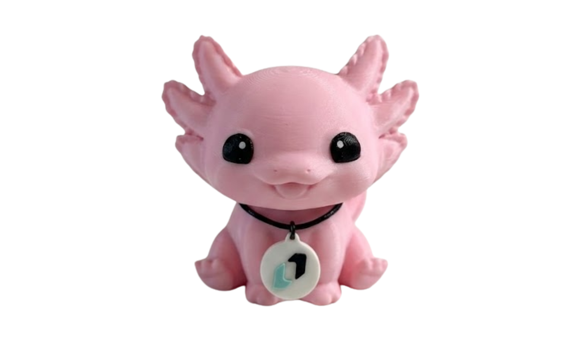 Custom Desk Buddy, pink 3D-printed axolotl desk figurine wearing a necklace with a logo charm