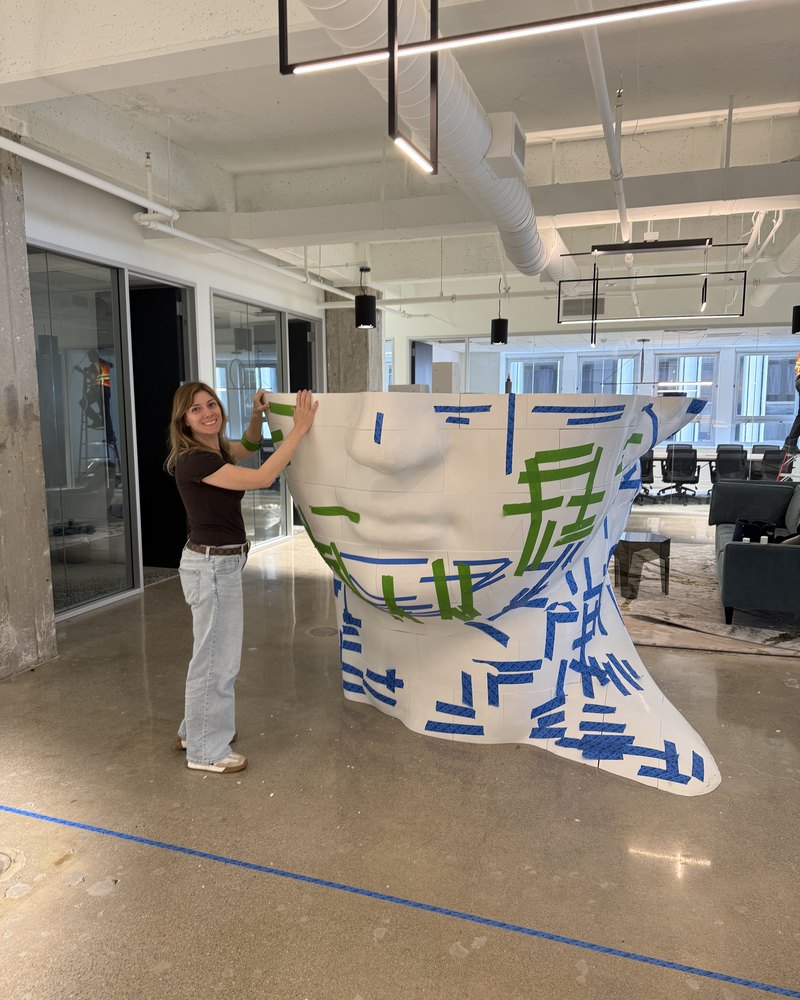 Mathilde, founder of The Bear Bar, with one of her 4-foot mascot builds
