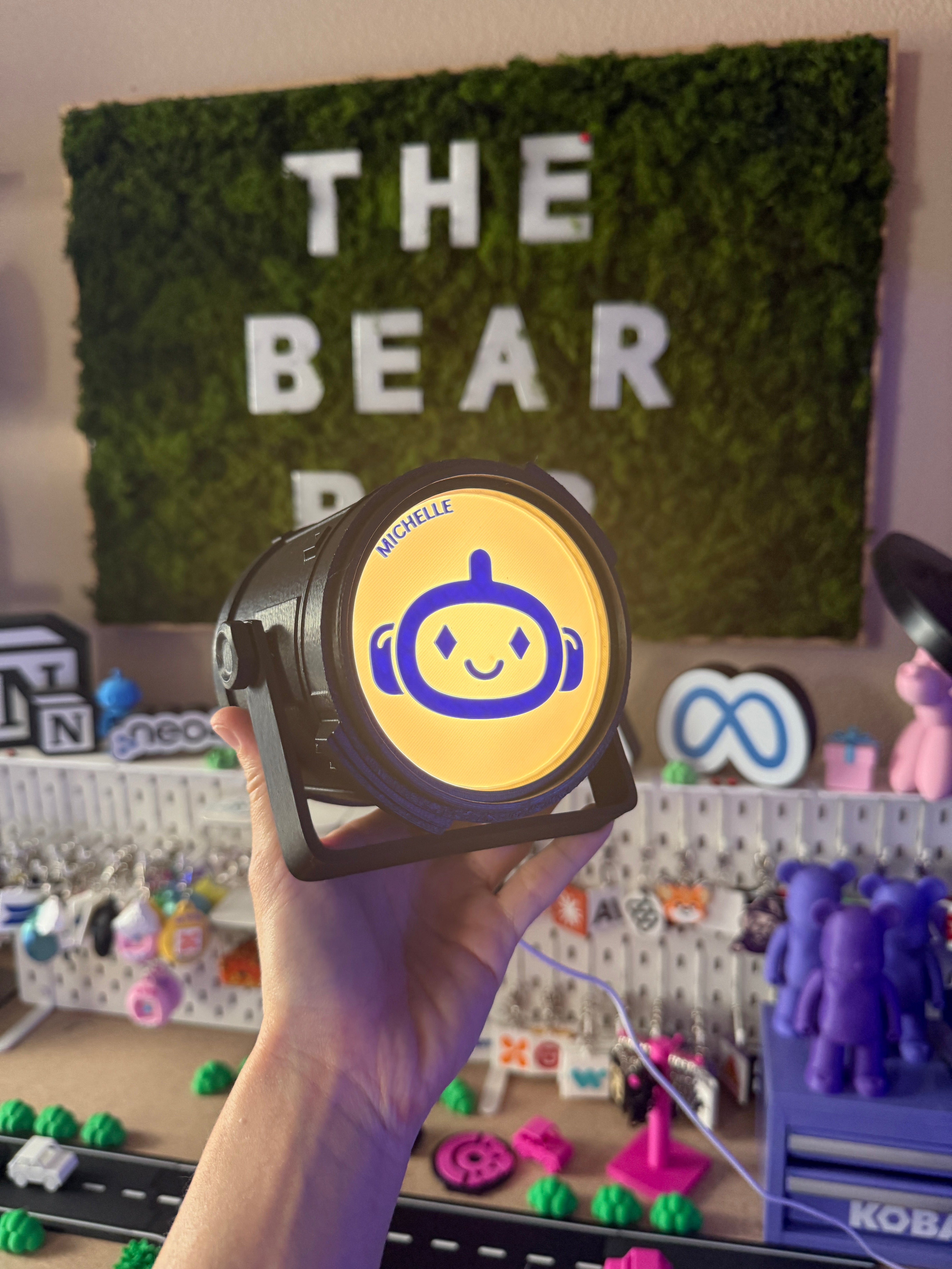 Custom branded spotlight with a personalized backlit logo.Branded Spot Light