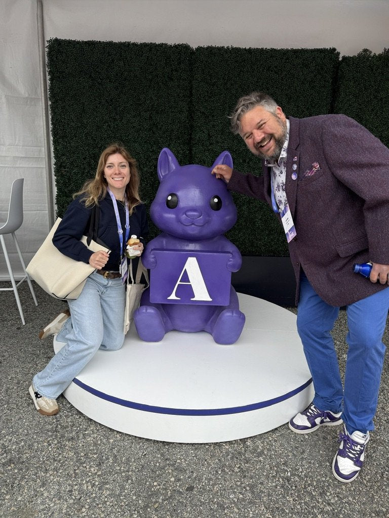 Custom 3D printed branded swag by The Bear Bar — portfolio example 112: Attendees posing with Ashby's custom mascot at the Ashby One conference.